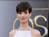 Anne Hathaway shooed paparazzi away with dog's poop