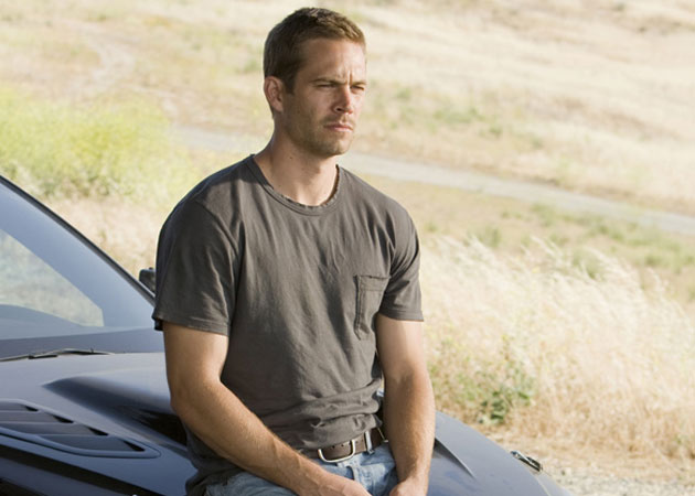 Paul Walker's crash site evacuated for family members