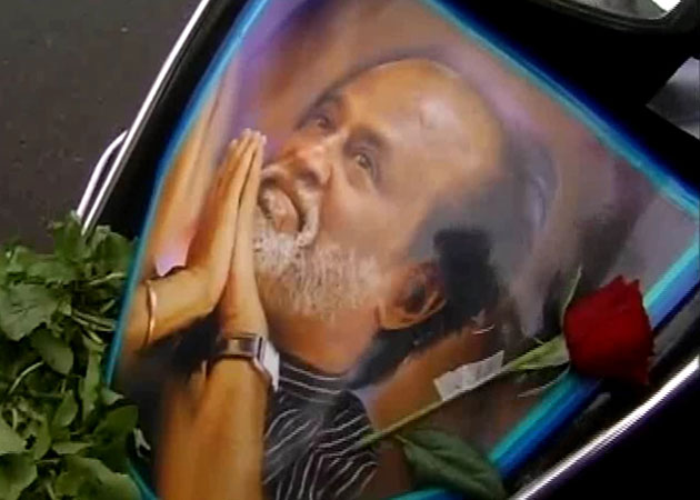 Gold coin <i>puja</i> for Rajinikanth's 63rd Birthday