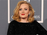Adele won Grammy while in bed