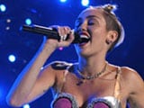 Miley Cyrus, former twerker, spits at concert crowd