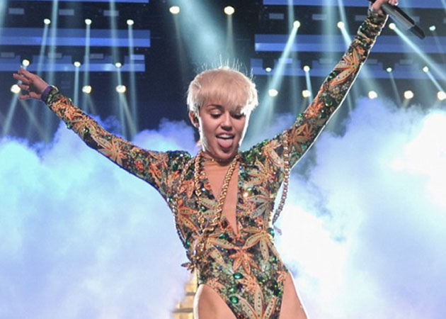 Miley Cyrus shocks again with risqu&eacute; cover art