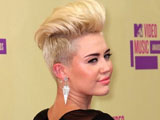 Miley Cyrus still hospitalised, cancels more shows