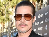 At <i>Maleficent</i> Premiere, Brad Pitt Punched by Serial Prankster