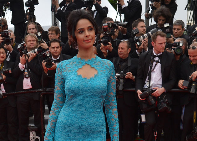 At Cannes, Mallika Sherawat Wears Blue Pucci and Diamonds  