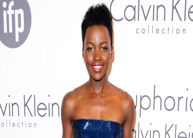 Cannes 2014: Lupita Nyong'o Stuns in and at Calvin Klein