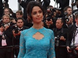 At Cannes, Mallika Sherawat Wears Blue Pucci and Diamonds
