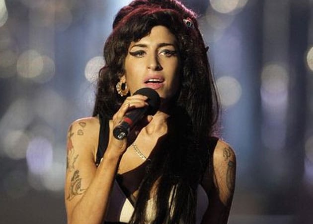 Amy Winehouse's Father Says he Feels Her Presence Around Him