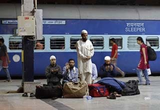 INSIGHT: Life and death on India's slow train to prosperity