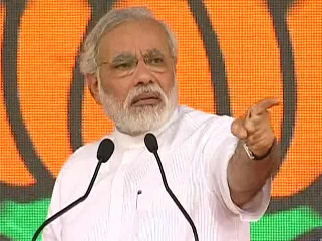 At Delhi rally, Narendra Modi wonders whether PM can face Nawaz Sharif confidently