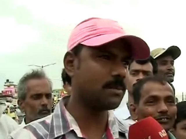 Cyclone Phailin: 'Won't leave, we have full faith in God'