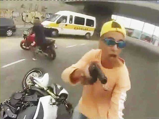 Dramatic video of man shot by police after stealing motor cycle at gunpoint