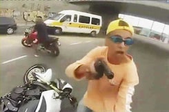 Dramatic video of man shot by police after stealing motor cycle at gunpoint Dramatic video of man shot by police after stealing motor cycle at gunpoint
