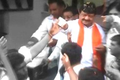 BJP minister seen handing out cash says he may not seek re-election BJP minister seen handing out cash says he may not seek re-election