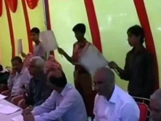 In Uttar Pradesh, children made to fan babus at meeting