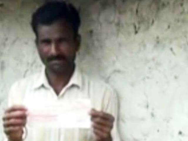 For this Maharashtra farmer, a cheque for Rs. 80. That's some relief!