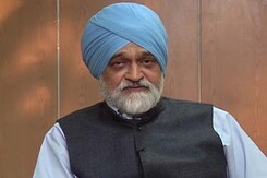 Elections to curtail expenditure; help fiscal deficit: Montek Elections to curtail expenditure; help fiscal deficit: Montek