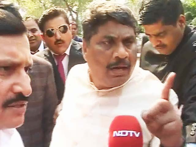 Why should I apologise, asks MP who yanked mic