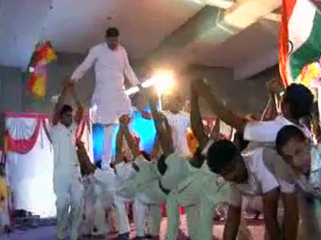 BJP candidate's walk of shame, on schoolchildren's backs