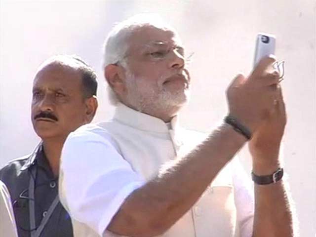 Watch: Narendra Modi takes a selfie after voting in Ahmedabad