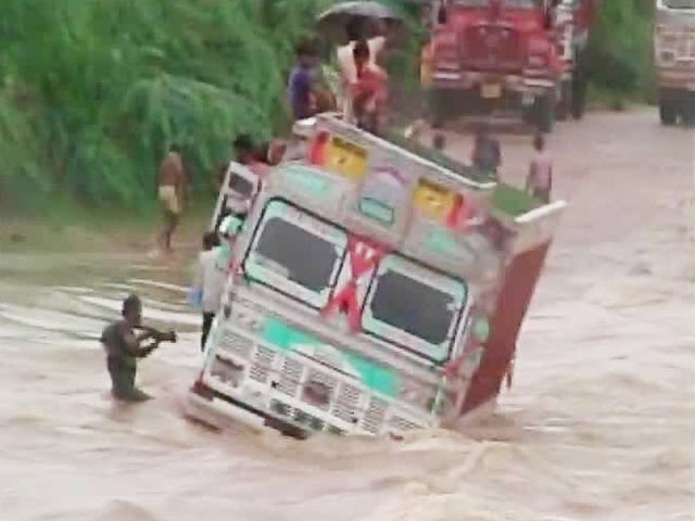 Truck Stuck in the Middle of a River in Rajasthan