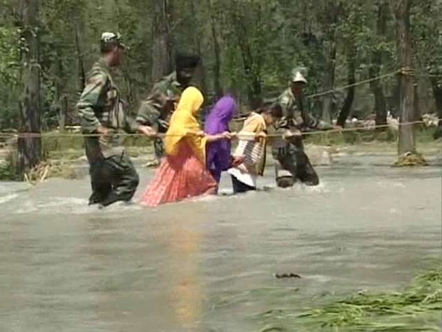 Crossing An Overflowing River, Holding a Rope and a Soldier's Hand