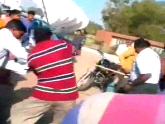 Video : Caught on Camera: Man Thrashed by BJP Law-Maker in Gujarat