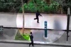 Charlie Hebdo Attack: Video of Gunmen Shooting Man on Pavement Charlie Hebdo Attack: Video of Gunmen Shooting Man on Pavement