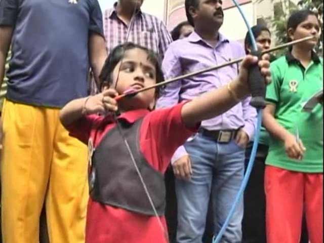 Toddler Shines With Bow and Arrow