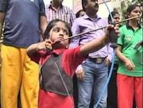 Toddler Shines With Bow and Arrow