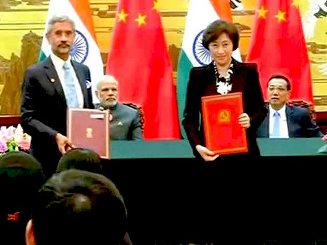 पीएम मोदी और चीनी पीएम के बीच वार्ता के बाद 24 समझौतों पर हस्ताक्षर