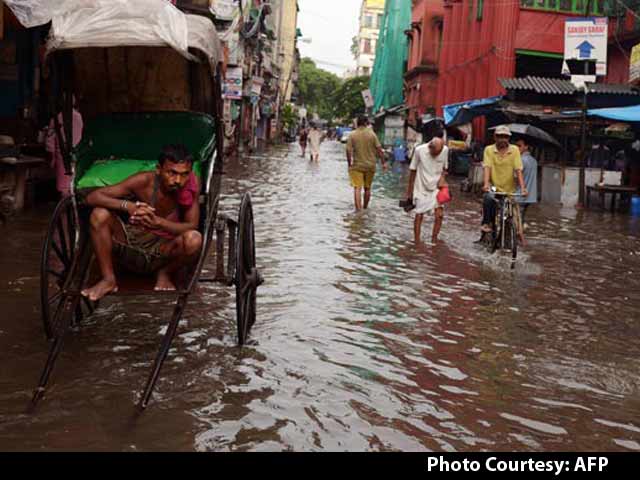 Knee-High Water After Overnight Rain Drowns Kolkata's Roads
