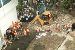 11 Dead After 50-Year-Old Building Collapses in Thane Near Mumbai 11 Dead After 50-Year-Old Building Collapses in Thane Near Mumbai