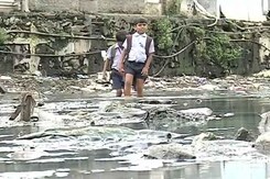 These Mumbai Children Wade Through Knee-Deep Sewage to Make it to School These Mumbai Children Wade Through Knee-Deep Sewage to Make it to School