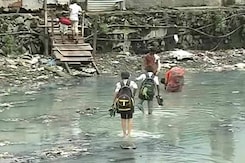 For 200 Kids Who Walk Through Sewage to School, Finally, a Bridge For 200 Kids Who Walk Through Sewage to School, Finally, a Bridge