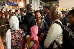 Germans Welcome Refugees With Open Arms in Munich Germans Welcome Refugees With Open Arms in Munich