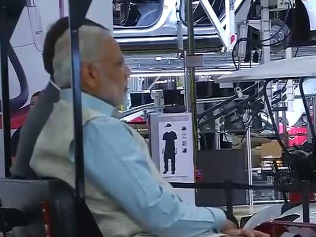 PM Modi Takes A Ride In Tesla's Electric Car Factory