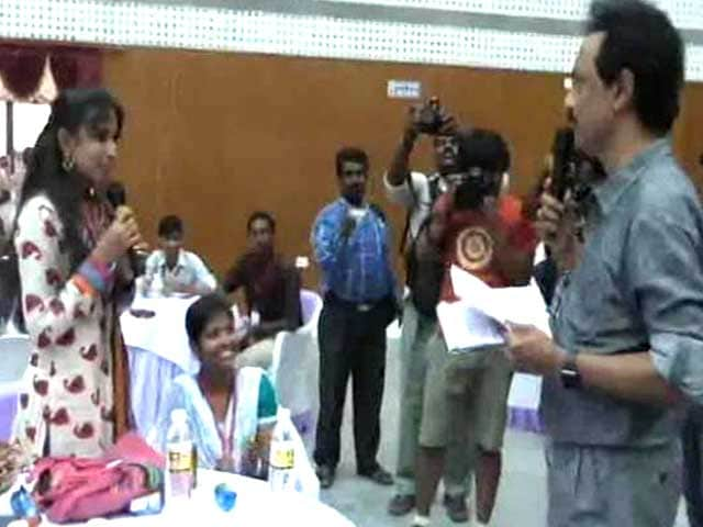 Video : Girl 'Gifts' Liquor to MK Stalin, Seeks Prohibition in Tamil Nadu