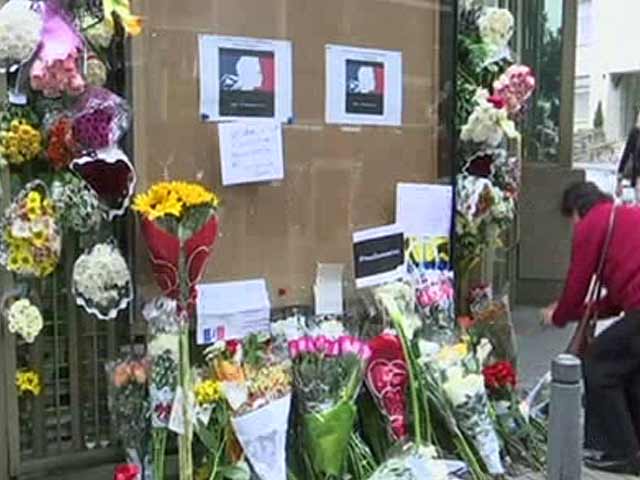 John Lennon And Emily Dickinson: How Paris Mourns