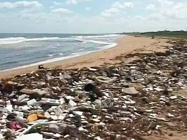 Heavy Rains Flood Chennai Beaches With Garbage