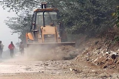 Gurgaon Dumps Waste In Aravalli Forest To Clean Road For PM Modi's Visit Gurgaon Dumps Waste In Aravalli Forest To Clean Road For PM Modi's Visit