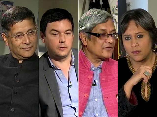 'How People Spend Money Is Their Business': 'Modern Marx' Debates 'Team Modinomics'