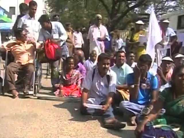 In Wheelchairs, Crutches, For Rights They Stand Up