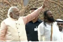 Sri Sri Event Draws Thousands Despite Rain, PM Arrives Sri Sri Event Draws Thousands Despite Rain, PM Arrives