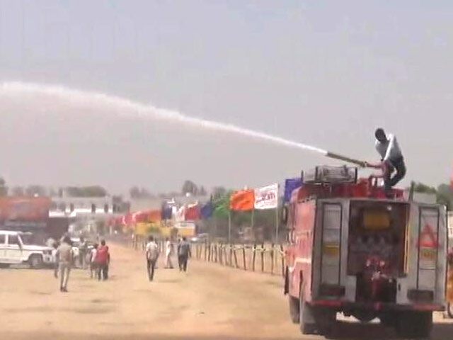 सोनीपत में अमित शाह के कार्यक्रम स्थल पर हजारों लीटर पानी का छिड़काव