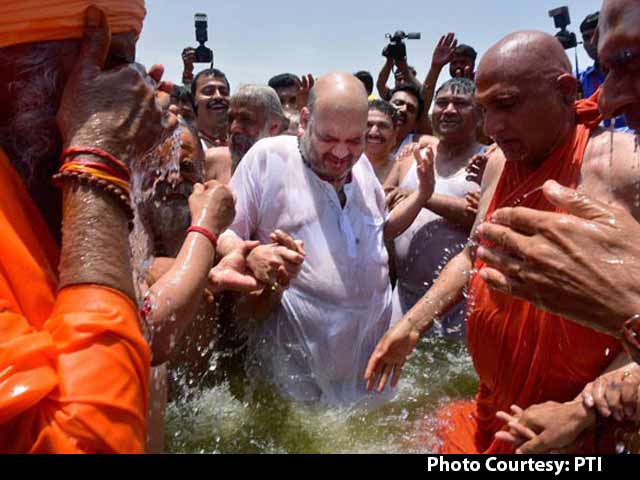 Video : BJP Chief Amit Shah Takes Holy Dip Alongside Dalit Sadhus At Kumbh Mela In Ujjain