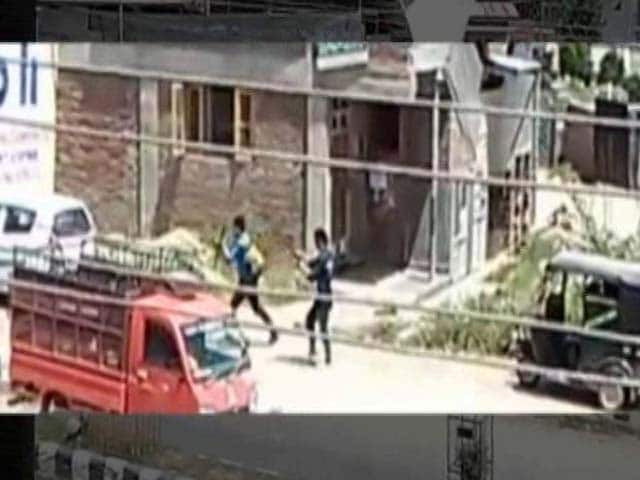 Video : Terrorists With AK-47s Fire At Police In Attack Caught On Camera