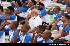 PM Modi Leads Yoga Day Events, Says 'Yoga Not Religious Activity' PM Modi Leads Yoga Day Events, Says 'Yoga Not Religious Activity'