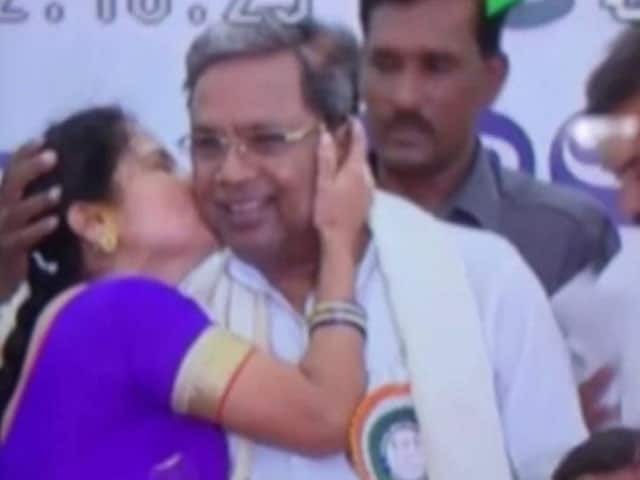 Video : Kiss And Tale: Woman's Surprise Greeting For Siddaramaiah