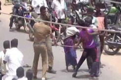 In Video, 3 Cops Seen Thrashing Family As People Watch In Video, 3 Cops Seen Thrashing Family As People Watch